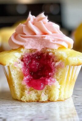 Himbeer-Zitronen-Muffins mit cremigem Topping